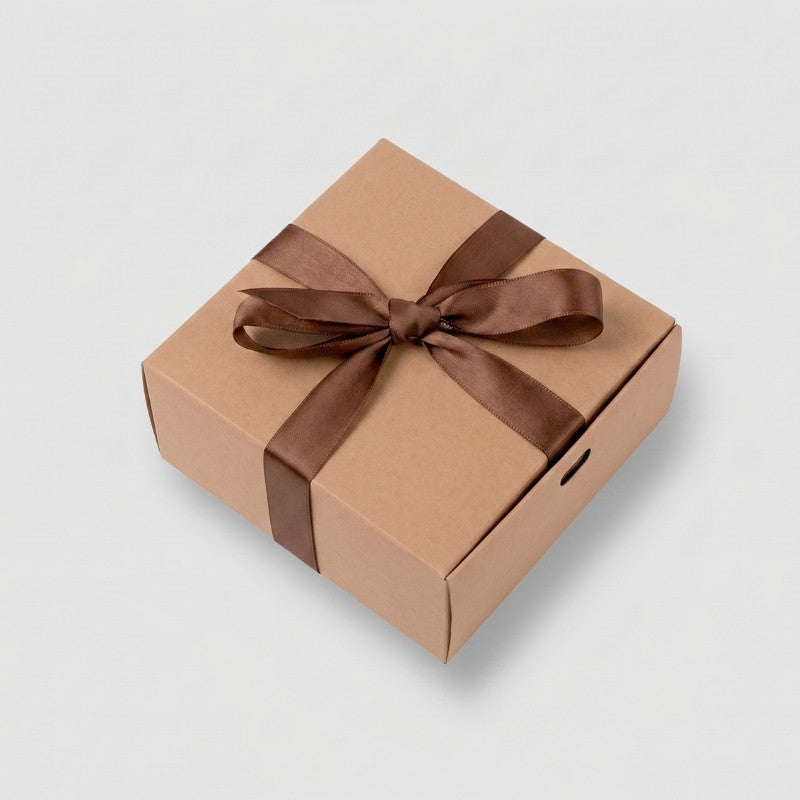 Walnut folio art kit in a kraft gift box tied with a brown ribbon bow